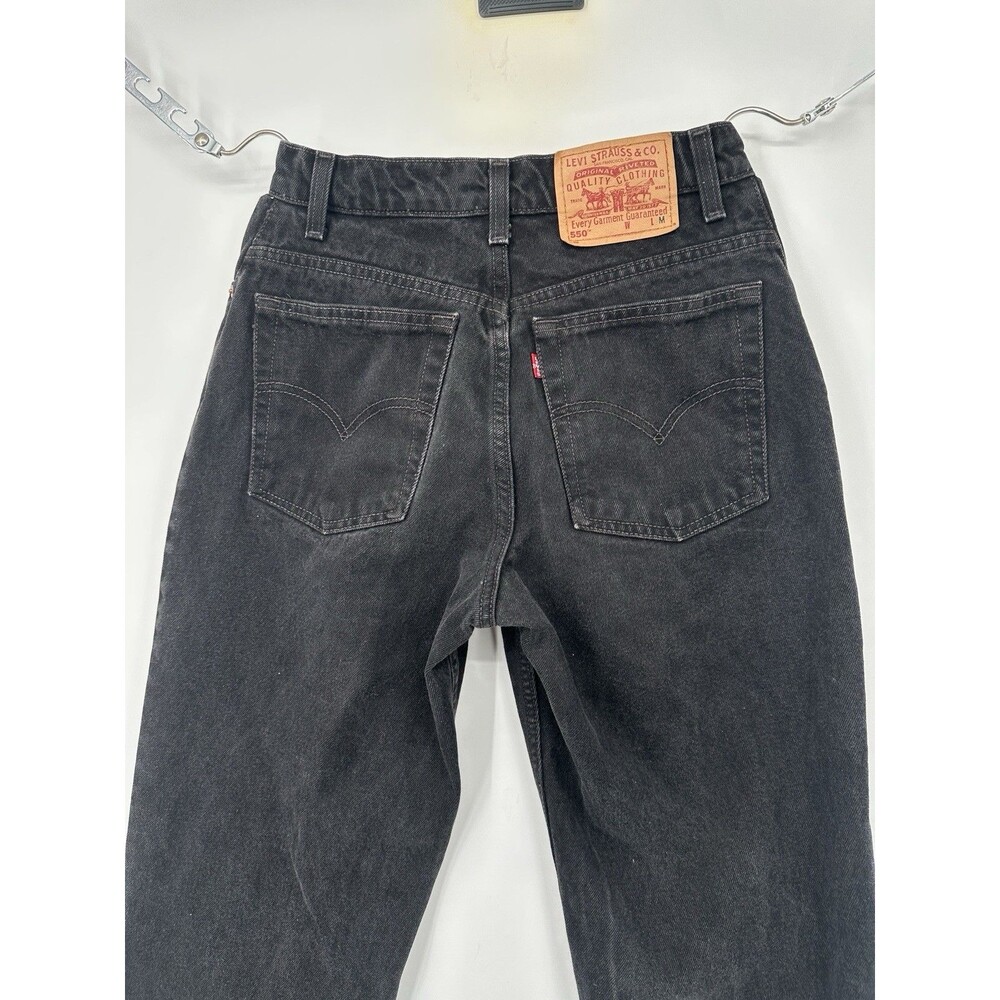 Vintage Levi’s 550  relax fit tampered leg  Size 26/8 Raw hem‎ made in USA